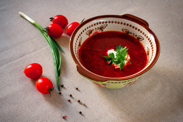 Traditional Ukrainian borsch with sour cream 
