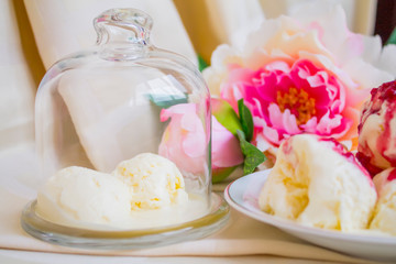 Still-life. Ice-cream Ice-cream with jam. Peonies. Sweets.