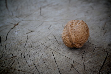 walnut on a wooden background