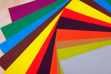 Many colored sheets of cardboard