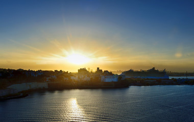 Cruise Ship docked at port San Juan on sunrise. 