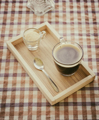 Coffee cup in the morning, hot black coffee in vintage tone