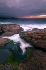 Sunset in the basque coast under Jaizkibel mountain in Hondarribia, Basque Country.