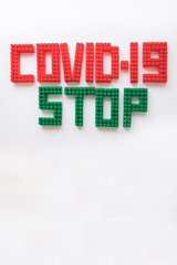 description covid-19 of the constructor blocks on the white background