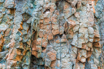 Abstract background from toned mountains texture, volcanic basalt as in Iceland. Bright colorful...