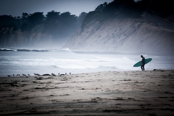surfer on a california beach