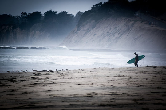 surfer on a california beach