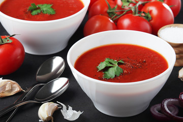 Two plates with gazpacho - traditional Spanish tomato soup	