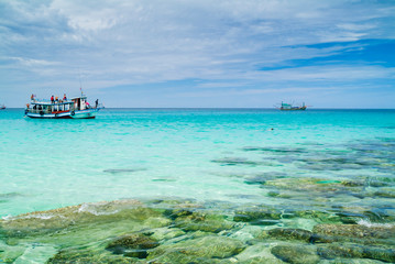 divers boat and fishing boat at rest in a bay of Koh Tao