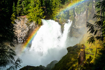 waterfall in the forest with rainbow 2