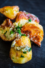 Roast potatoes with garlic and parmesan cheese.  