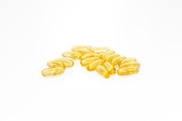 Omega 3 yellow soft gel pills isolated on white background. Copy space