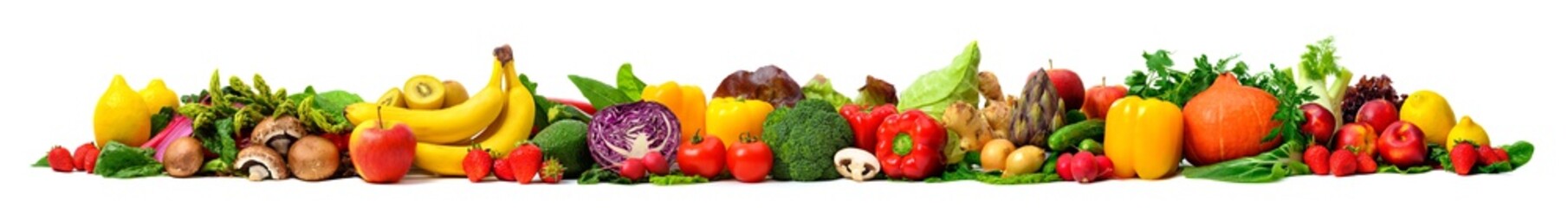 Arrangement of fruits and vegetables in many appetizing colors in a row, concept for a healthy plant-based lifestyle and fitness, super wide format ideal as a border, frame or banner