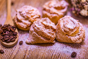 homemade backed cookies with coffee beans on a wooden desk with blure background. Soft focus photo.
