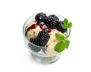 Soft ice cream with fresh blackberries isolated on white