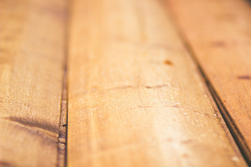 Wooden wall of the house of a peasant hut made of round logs