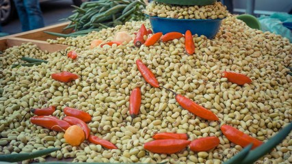 Cashew beans with small red pepper on top of cashew
