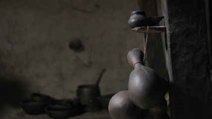 small brown pot tied with string on top