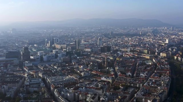 Vienna Austria aerial city center skyline and flying around St. Stephen's Cathedral ft. panorama of capital's street and central buildings. It is one of most famous cities in Europe and the World 4K