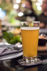 Glass of beer with blur background
