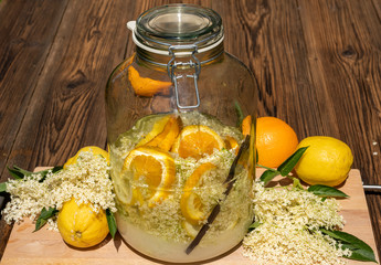 The elderflower liqueur is ready made, all ingredients are in the big preserving jar, fresh...