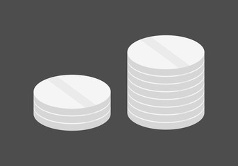 Pastillas blancas en un fondo negro.