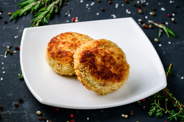 homemade cutlet on rustic background
