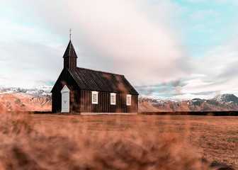 Black church in the mountains in Iceland