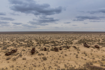 Rusting ships at the Ship Cemetery near Moynaq village at the former coast of Aral Sea, Uzbekistan