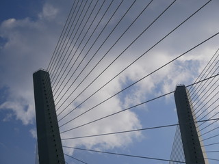 View of the cable-stayed bridge over the Golden horn Bay in Vladivostok on a cloudy summer day.