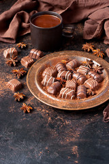 Tasty chocolate  candies  with cocoa drink