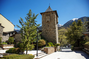 Fototapeta na wymiar Stone tower on the background of mountains