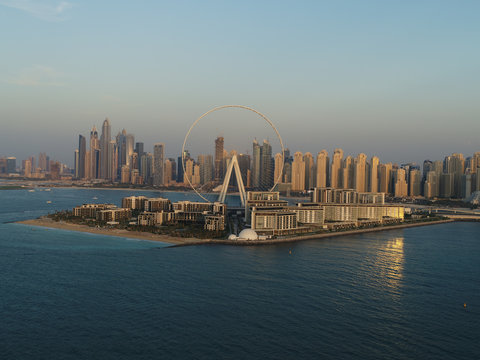 Aerial view of the Ferris wheel on Bluewaters island in Dubai, United Arab Emirates.