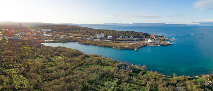 Panoramic aerial view of the construction of future LNG terminal on the shore of the bay, Omisalj, Croatia