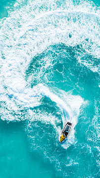 Aerial View of a jetski, Vashafaru, Haa Alif Atoll, Maldives, Indian Ocean, riding circles