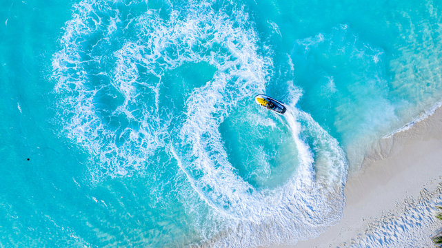 Aerial View of a jetski, Vashafaru, Haa Alif Atoll, Maldives, Indian Ocean, riding circles