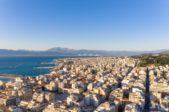 Aerial view of buildings with the sea in the background in Patras, Greece