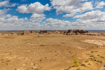 Earoded earthen walls of Ayaz Qala fortress in Kyzylkum desert, Uzbekistan