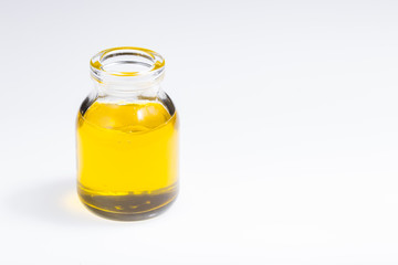 bottle with natural oil, isolated on white background