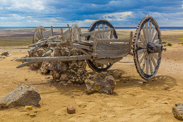 Old wooden carts near Ayaz Qala fortress in Kyzylkum desert, Uzbekistan