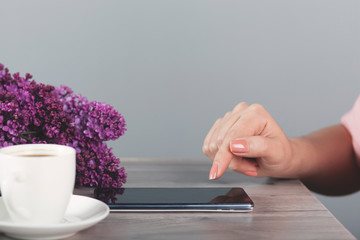  woman hand phone with coffee