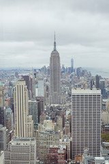 Panoramic view of Manhattan in the clouds from a skyscraper height