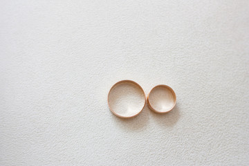 
Wedding rings on a white background