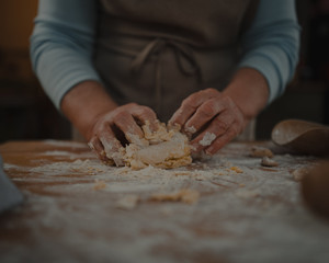 grandmother prepares fresh homemade pasta