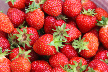 ripe juicy garden strawberries. Natural strawberry background.