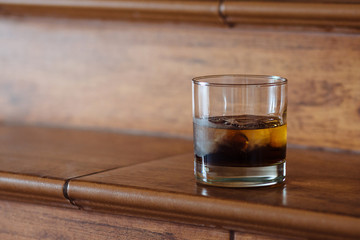 Whiskey on steps