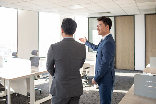 Successful business people talking in office