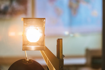 Schooling concept: Retro overhead projector in classroom, educational system
