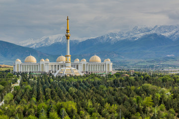 Independence monument and National Library in Ashgabat, Turkmenistan - obrazy, fototapety, plakaty