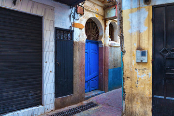View of the one of the old street in the Tangier Medina quarter in Northern Morocco. A medina is typically walled, with many narrow and maze-like streets.